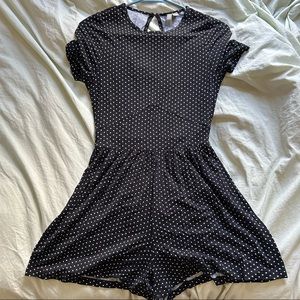 Black and white polka-dot romper